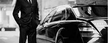Image of a Security Guard near a car